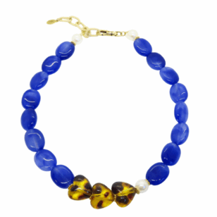 Ras de cou Gabrielle perles bleues royales et cœurs léopard